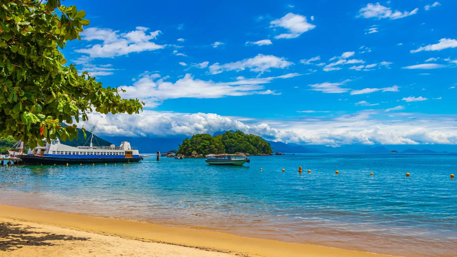 Abraao Beach boat ship sea mountains  island Ilha Grande, Rio de Janeiro, Brazil