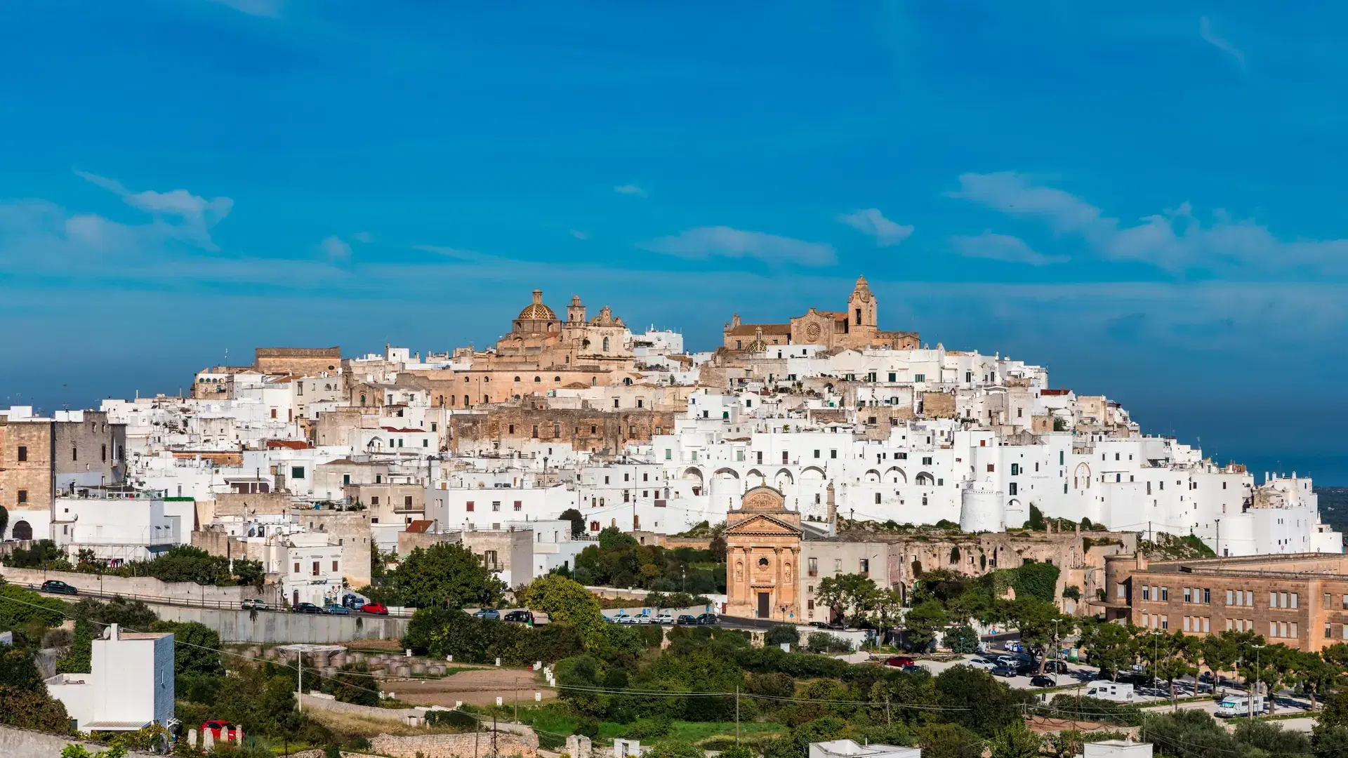 View of Ostuni white town, Brindisi, Puglia (Apulia), Italy, Europe. Old Town is Ostunis citadel. Ostuni is referred to as the White Town. Ostuni white town skyline and church, Brindisi, Italy.