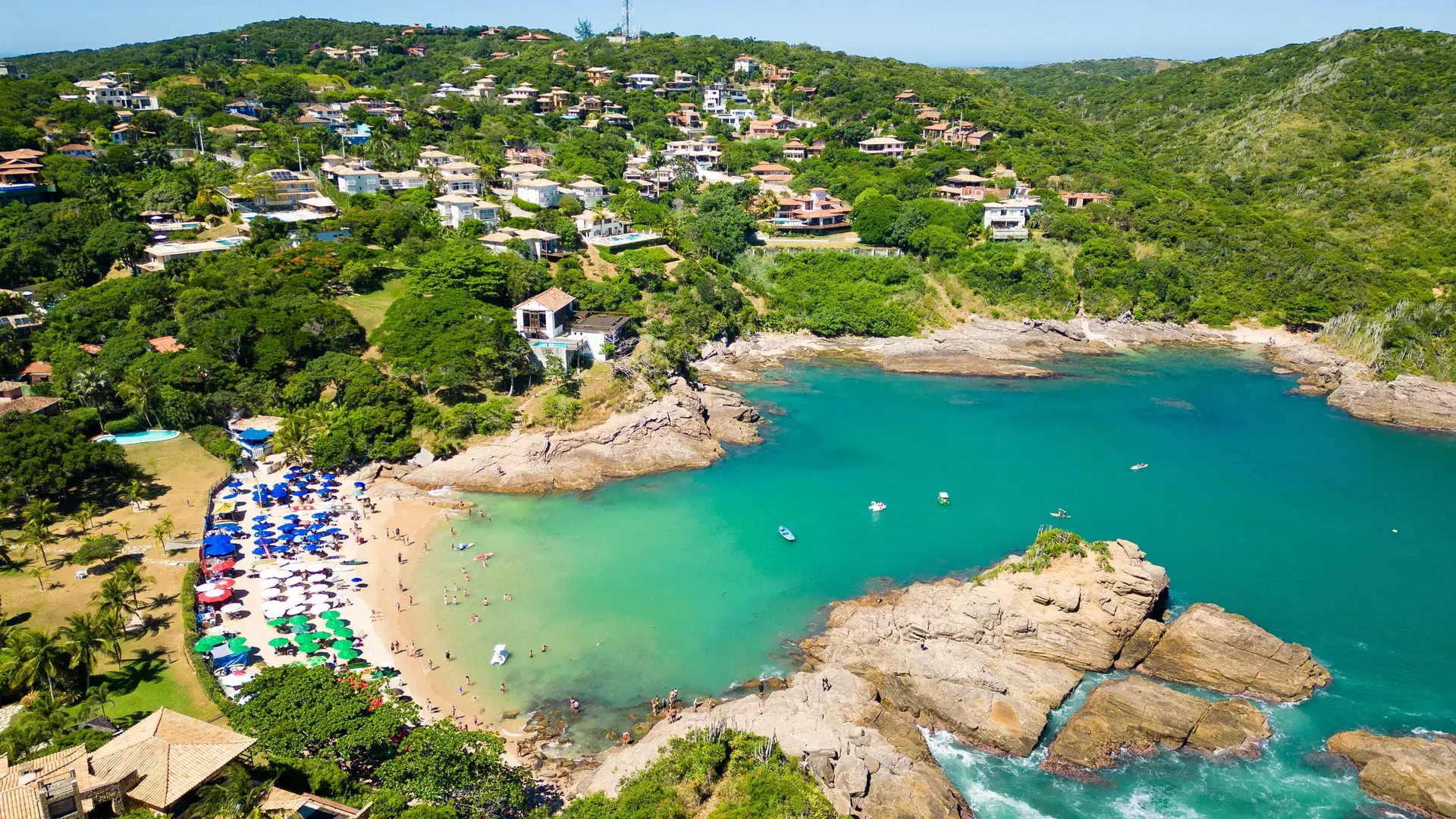 Aerial View of Small Ferradurinha Beach Surrounded By Rocks in Armacao dos Buzios Town Near Rio de Janeiro