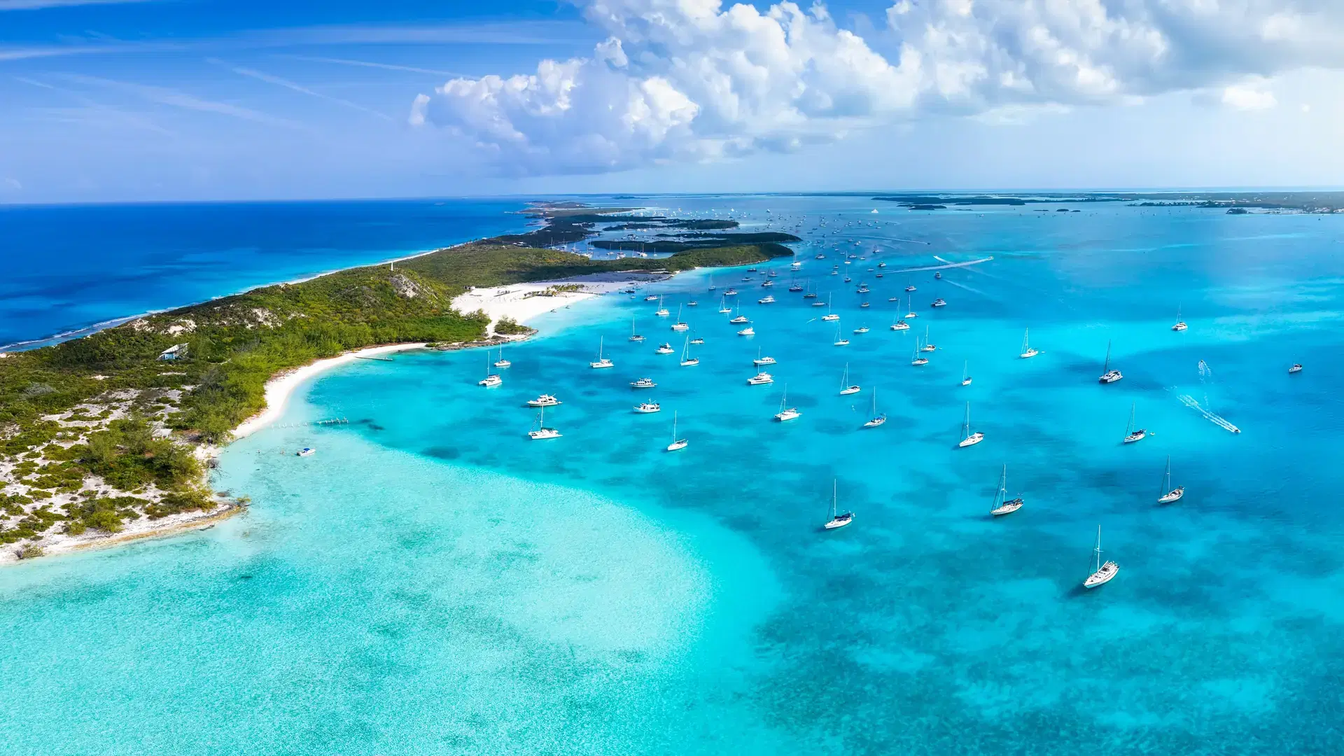 Aerial view of the beautiful coast of Stocking Island, The Exumas, Bahamas, with sandy beaches and turquoise ocean
