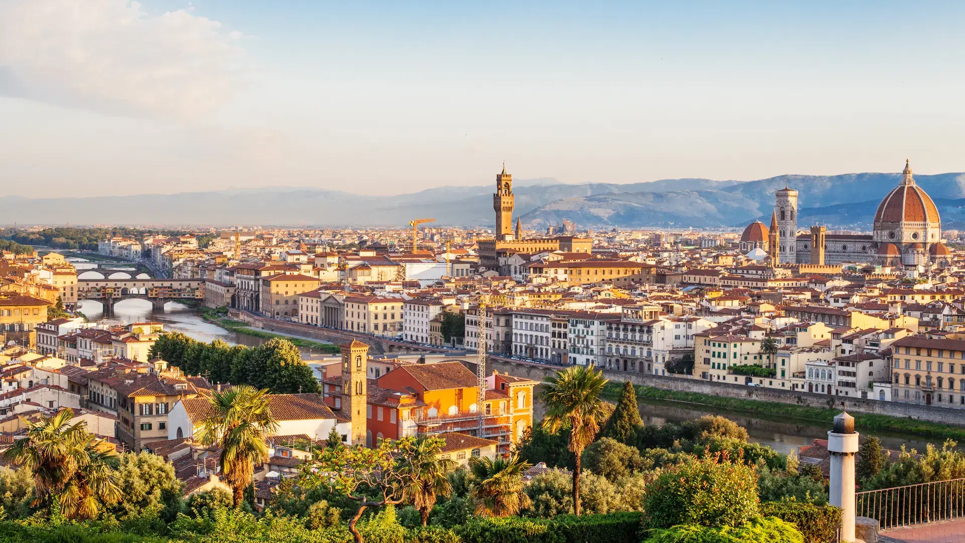 Florence Italy. Skyline cityscape of Firenze with Florence Duomo, Basilica di Santa Maria del Fiore and bridge Ponte Vecchio over the river Arno. 
