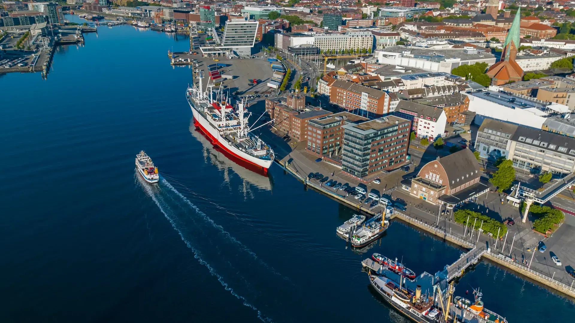 Aerial view of port of Kiel, Schleswig-Holstein, Germany. Aerial view of worlds largest museum freight ship moored in Kiel harbour. 