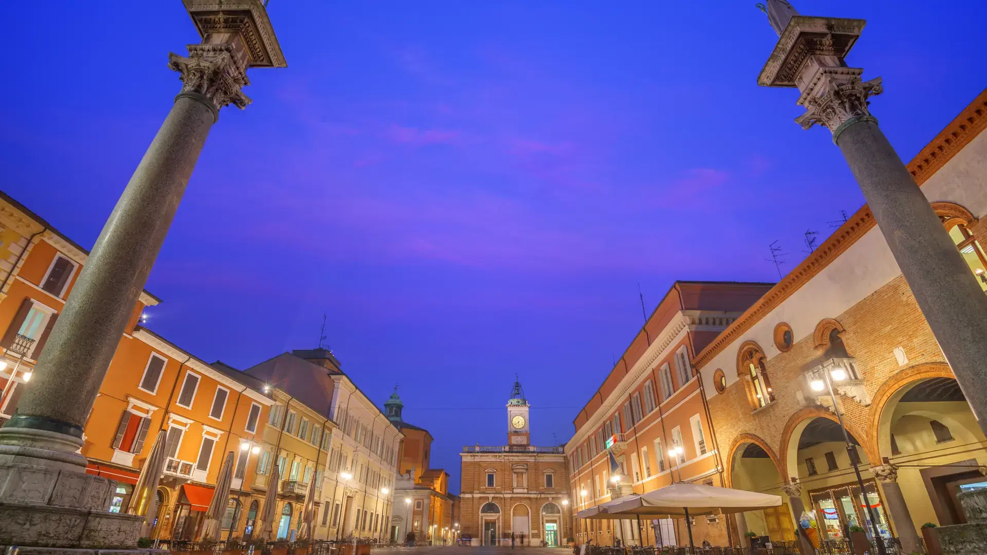Ravenna, Italy at Piazza del Popolo with the landmark Venetian columns at twilight.