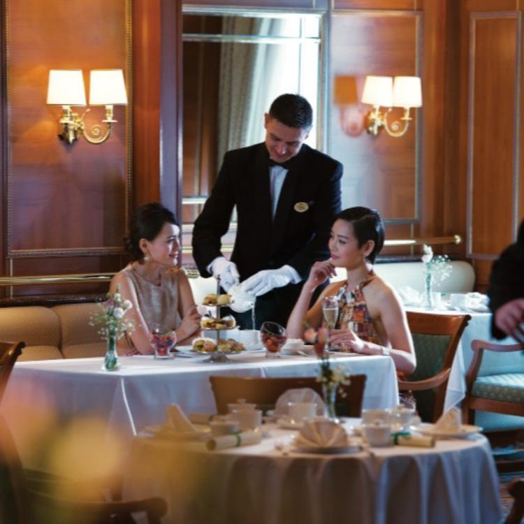 Waitress Serving Tea