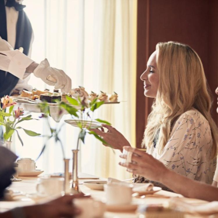 Waiter Serving Food