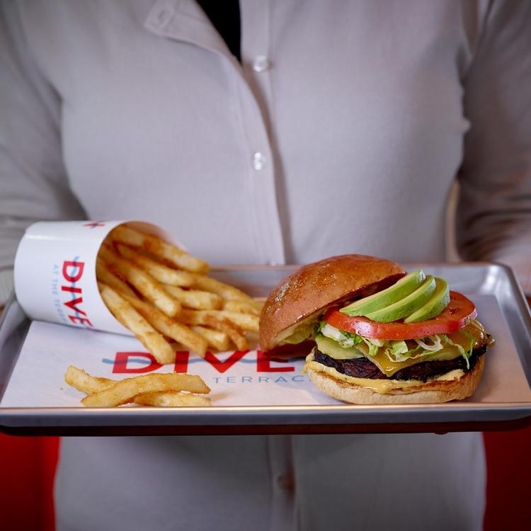 Server Holding Burger
