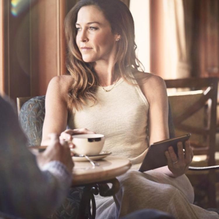 Couple drinking at table