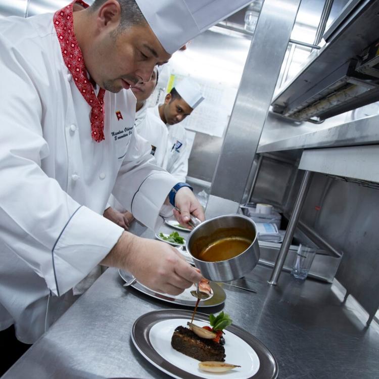 Chef preparing steak