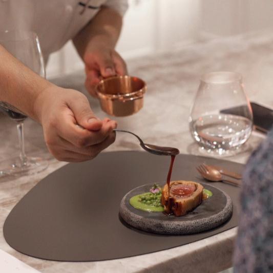 Chef plating food