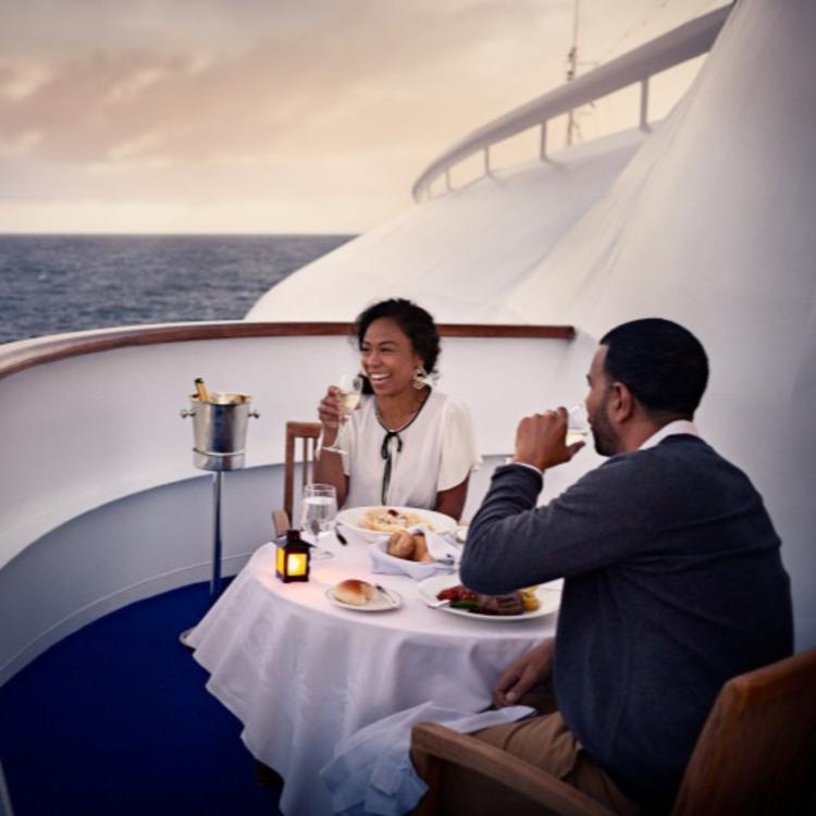 Couple Dining on Balcony