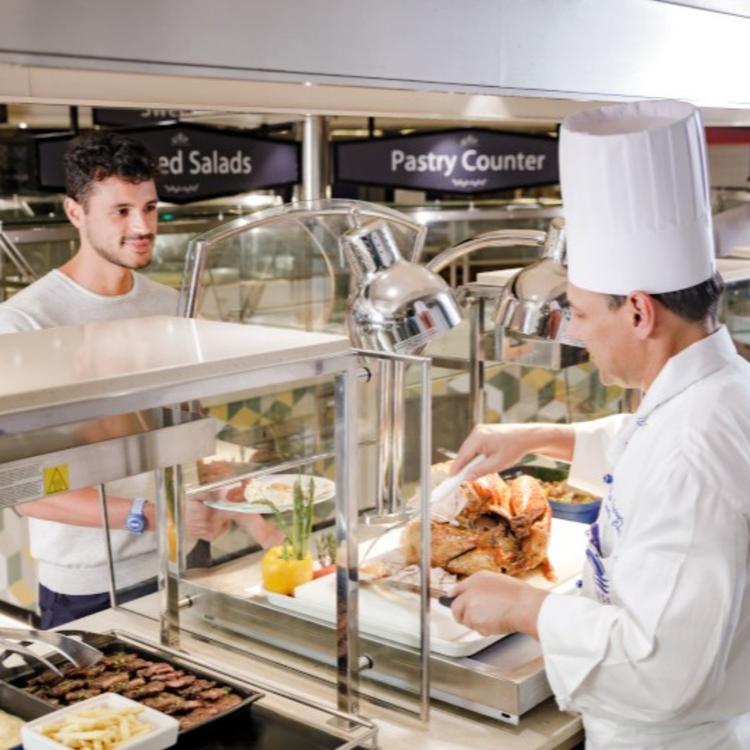 Chef at serving stations