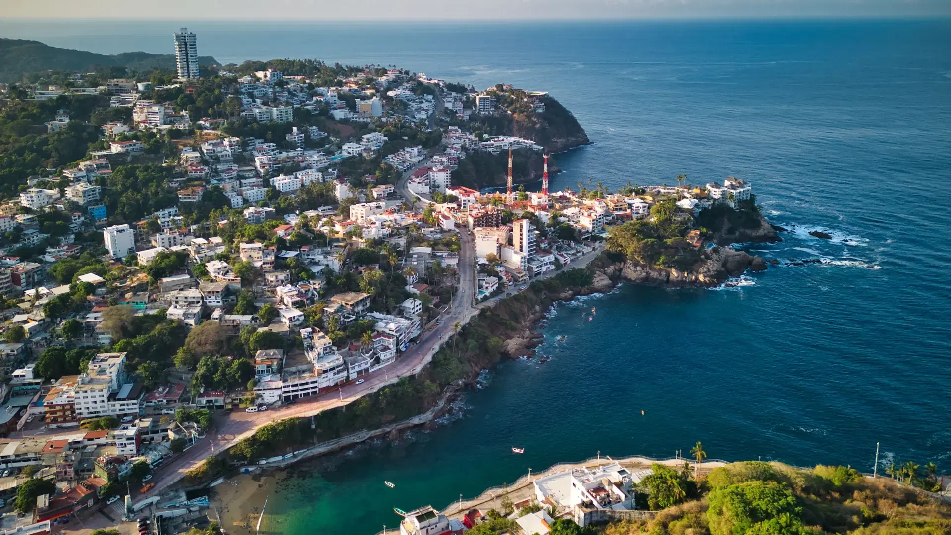 An aerial of Marina in Acapulco skyline surrounded by the beach and the sea