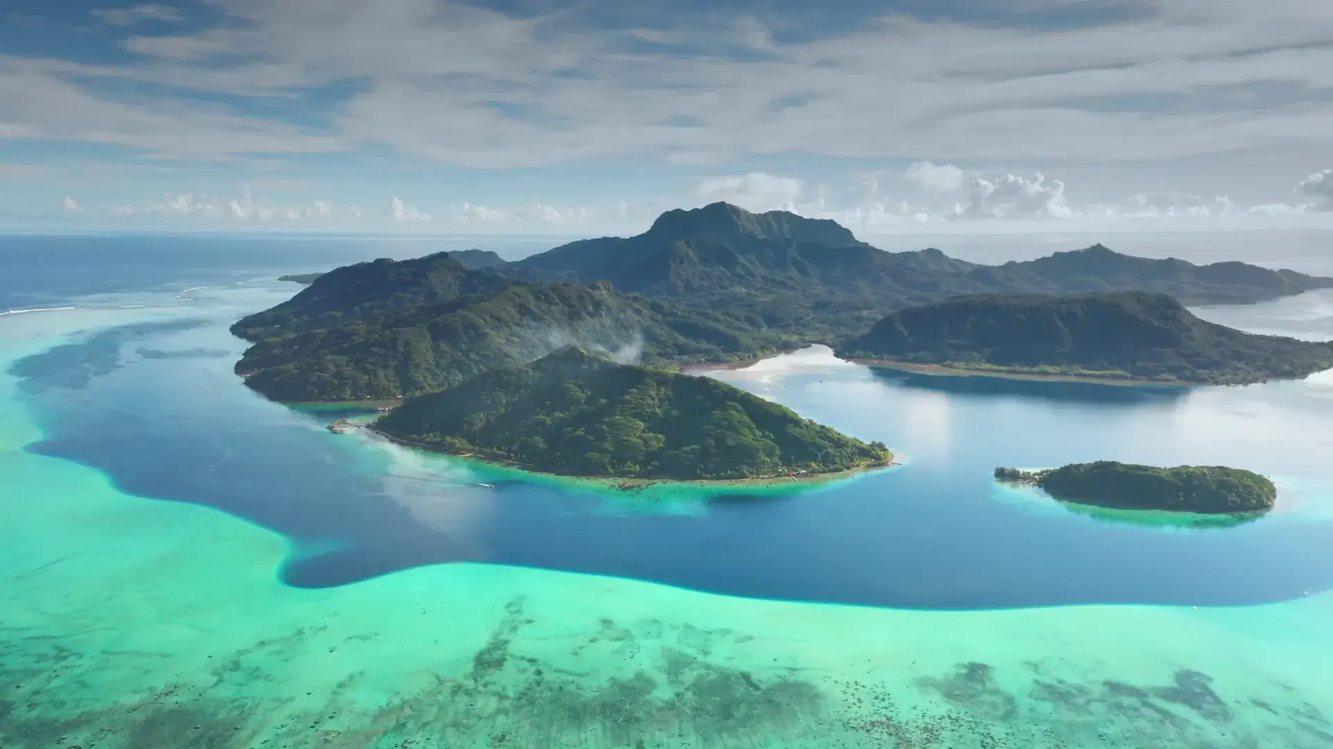 Breathtaking aerial view of tropical paradise green islands in turquoise lagoon coral reef barrier atoll, beauty of French Polynesia, Bora Bora. Summer holidays, luxury travel concept. Drone shot