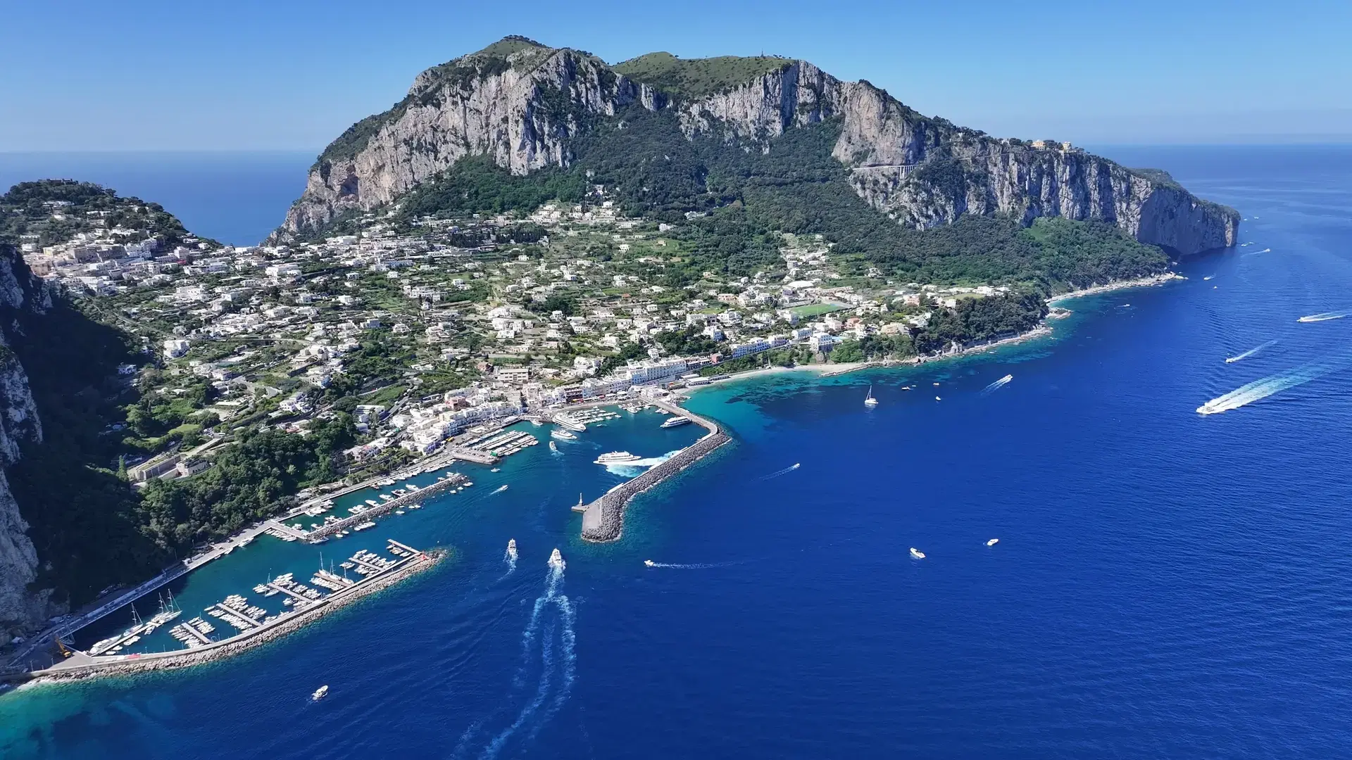 Island Of Capri At Naples In Campania Italy. Coastal City. Waterfront Landscape. Island Of Capri At Naples In Campania Italy. Beach Scenery. Medieval Buildings. Capri Skyline.
