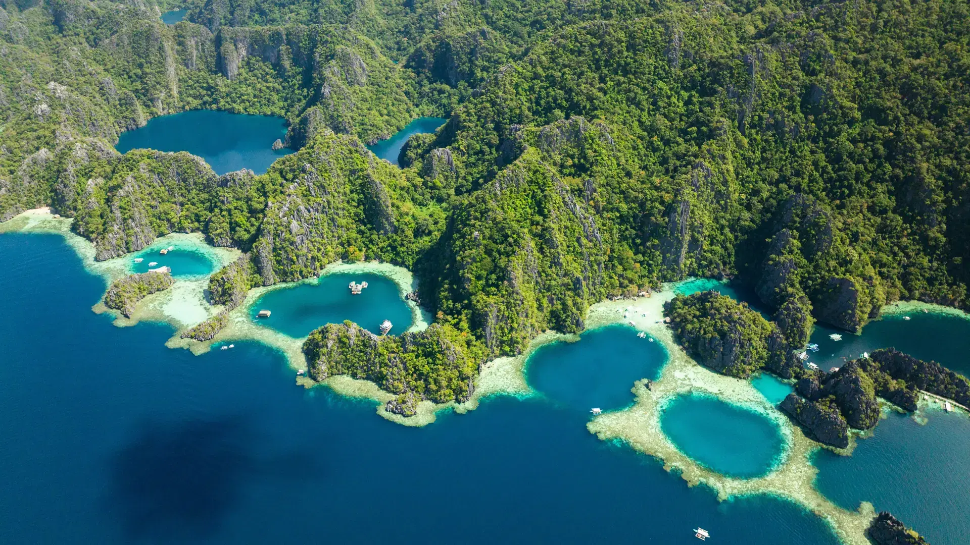 Barracuda Lake and Lagoons with boats. Coron, Palawan. Philippines.