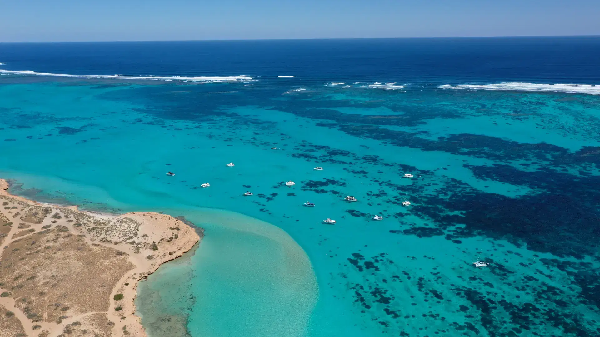 Boats and yachts moored off Coral Coast in Western Australia