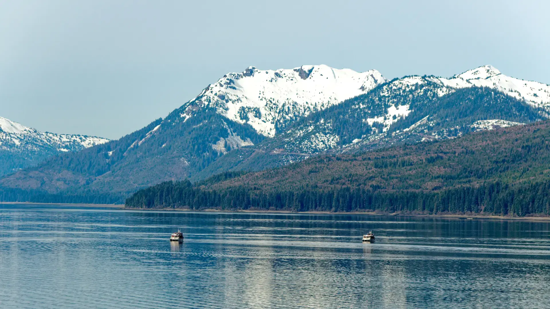 Whale Watching Boats Beneath Mountians in Icy Strait, Alaska