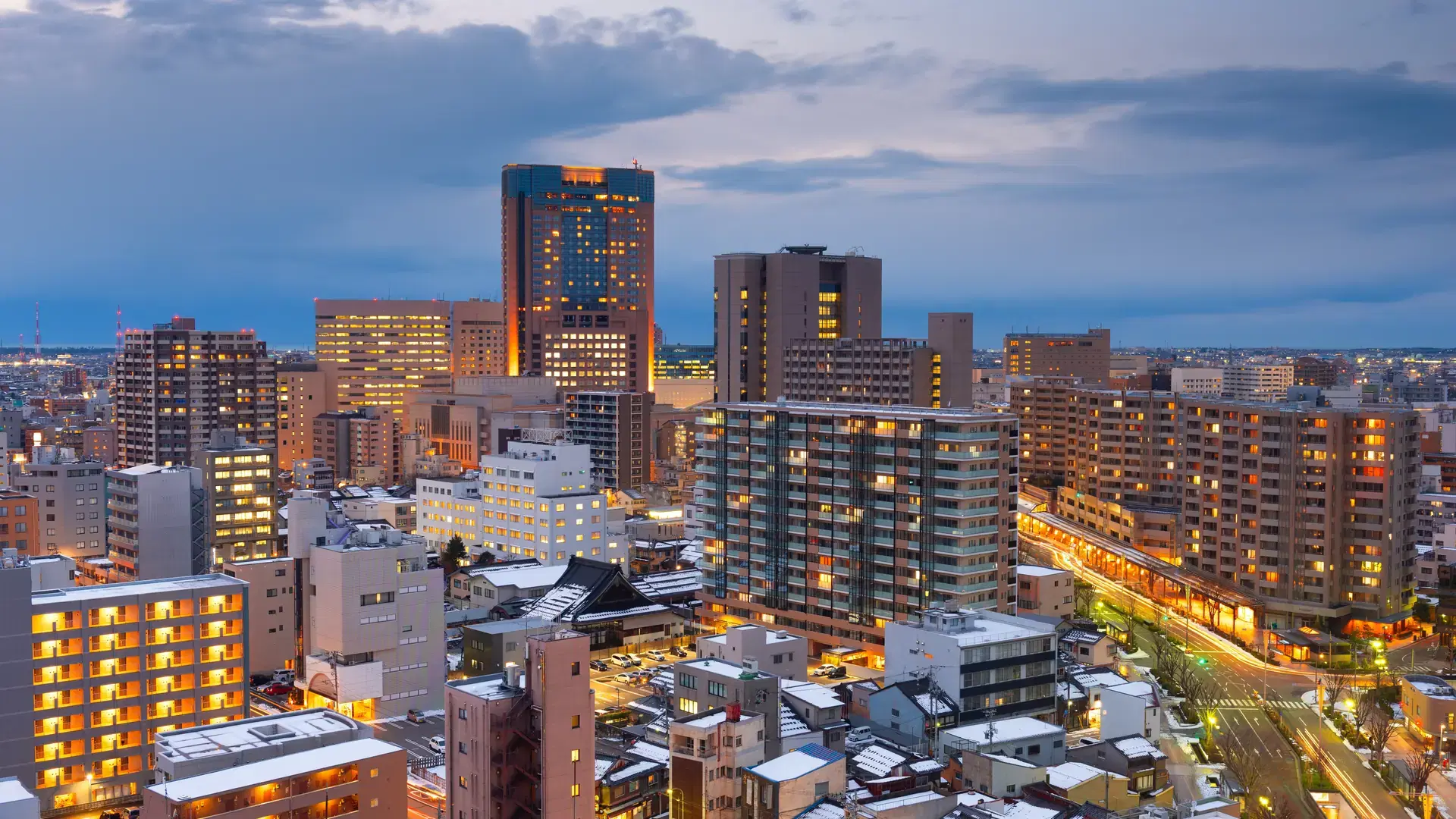 Kanazawa, Ishikawa, Japan downtown city skyline in winter at twilight.