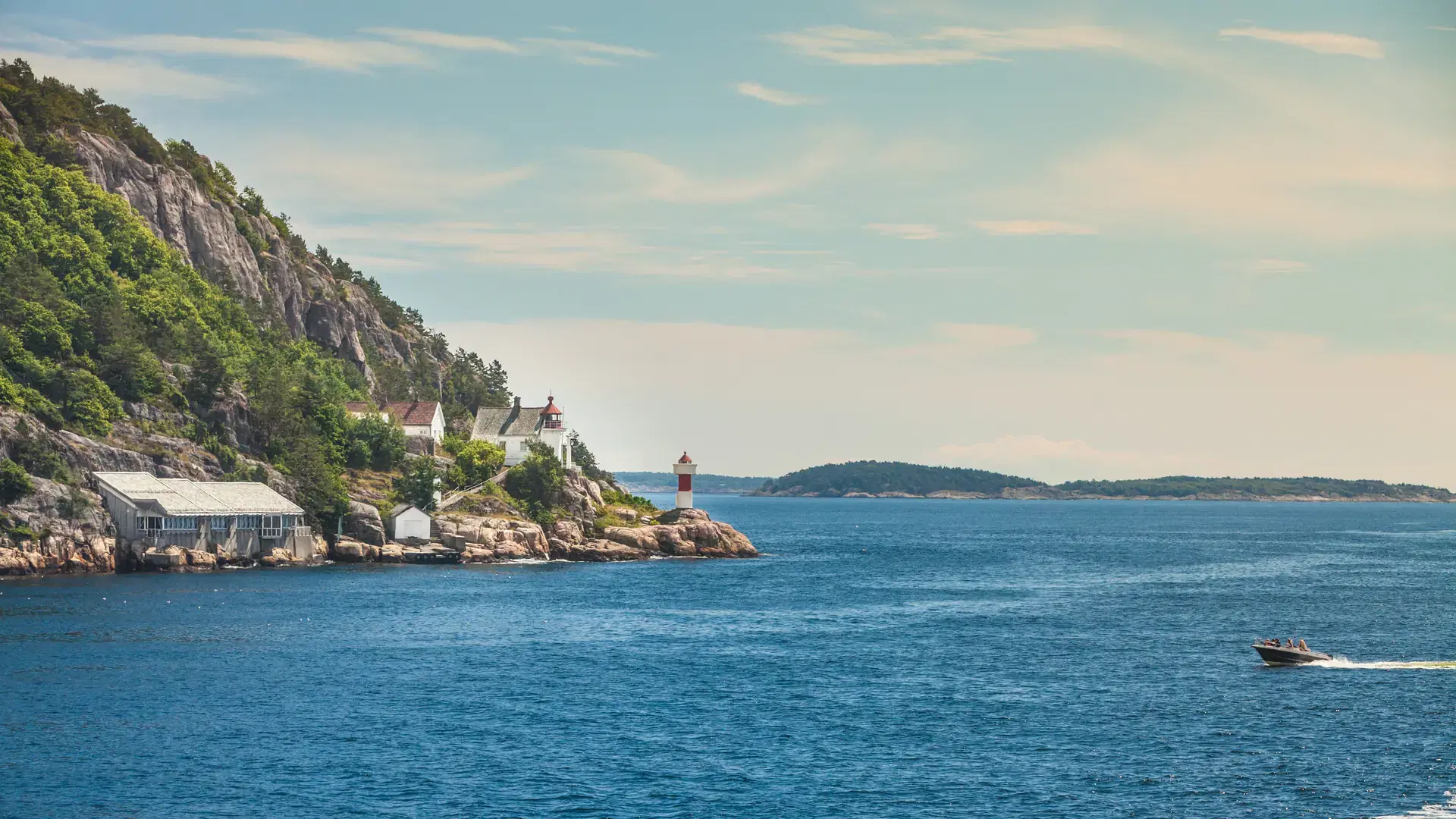 Beautiful seascape norwegian coastline, coast of Kristiansand with small lighthouse, Scandinavia Europe.