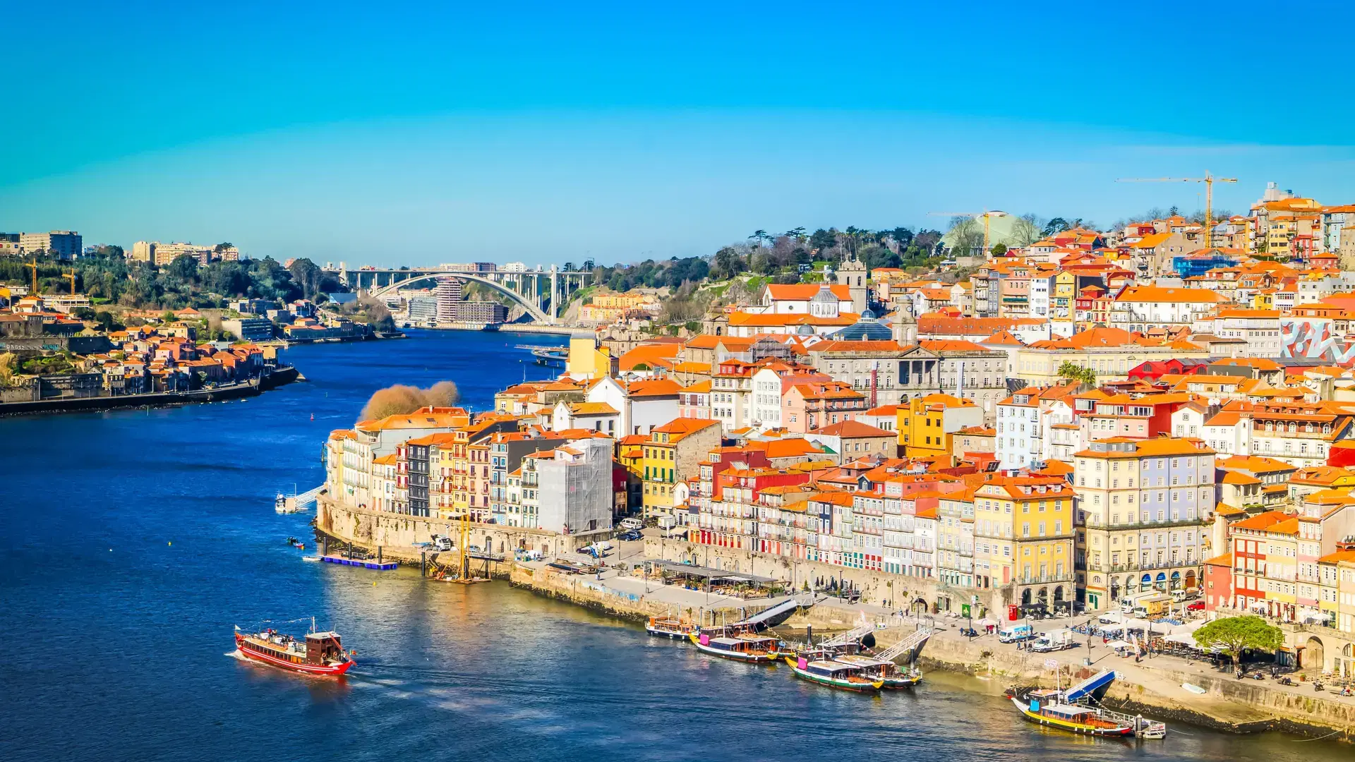 Picturesque, colorful view at old town Porto over Douro river. Oporto, touristic mediterranean city
