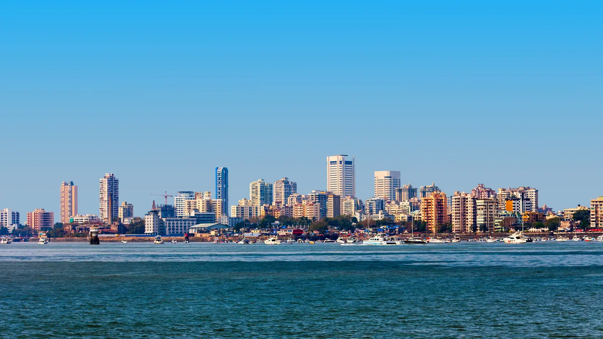 Mumbai city skyline panoramic view from Nariman Point at Marine Drive. Mumbai is a financial capital of India.