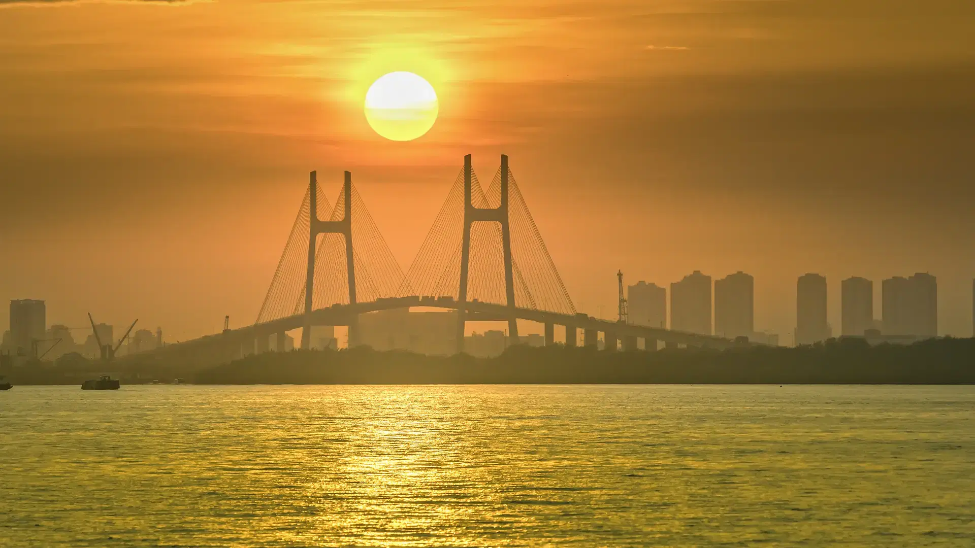 Beautiful colorful sunset at the Phu My Bridge near Ho Chi Minh City, Vietnam