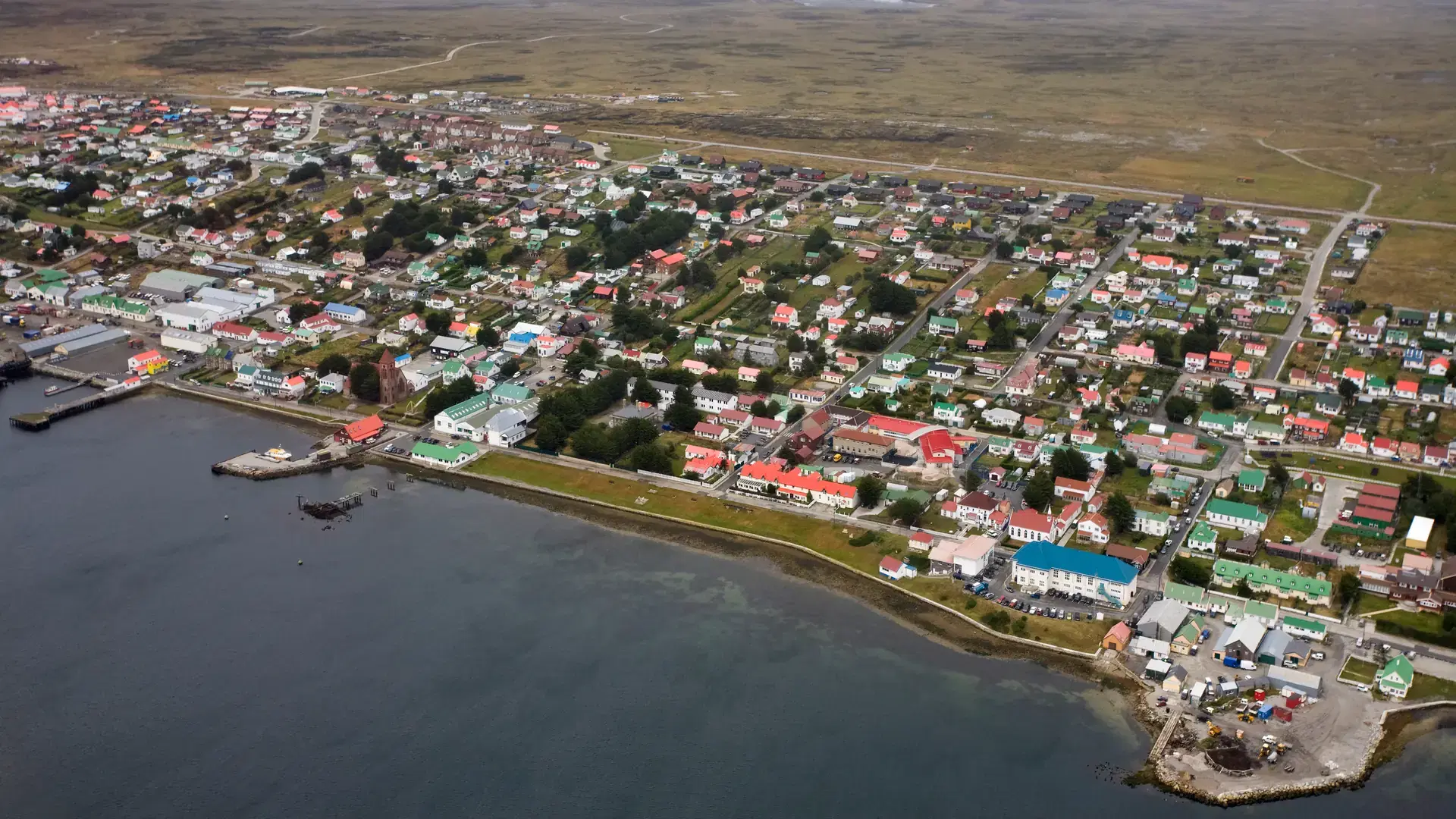 Aerial view of Stanley, the capital of the Falkland Islands (Islas Malvinas). Located on the island of East Falkland, is north-facing in one of the wettest parts of the islands.