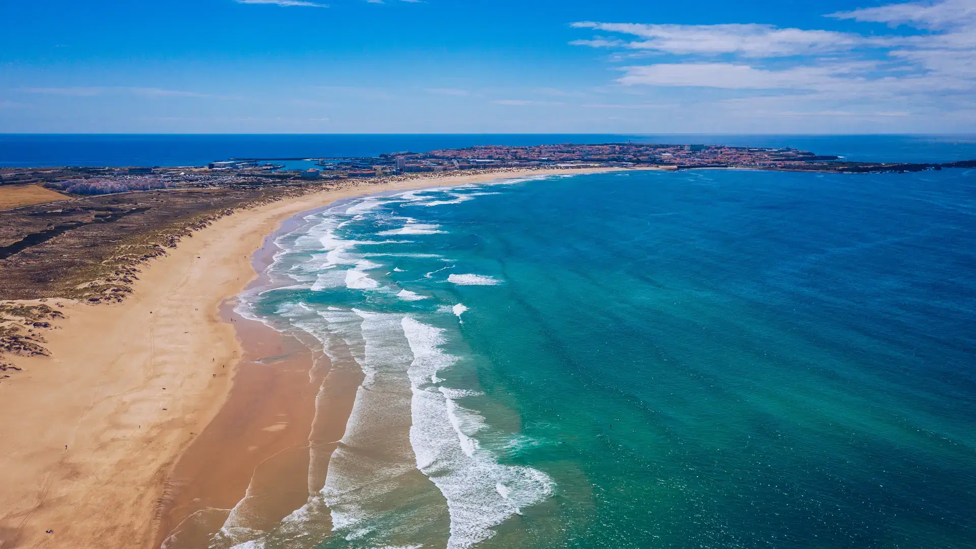 Campismo beach and Dunas beach and Island Baleal near Peniche on the shore of the Atlantic ocean in west coast of Portugal. Beautiful Baleal beach at Baleal peninsula close to Peniche, Portugal.