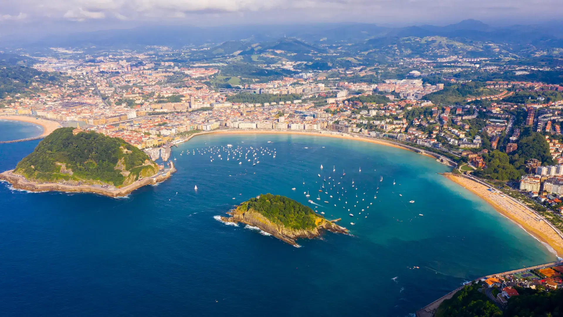 Aerial view of San-Sebastian and Beach of La Concha at sunny day, Spain..