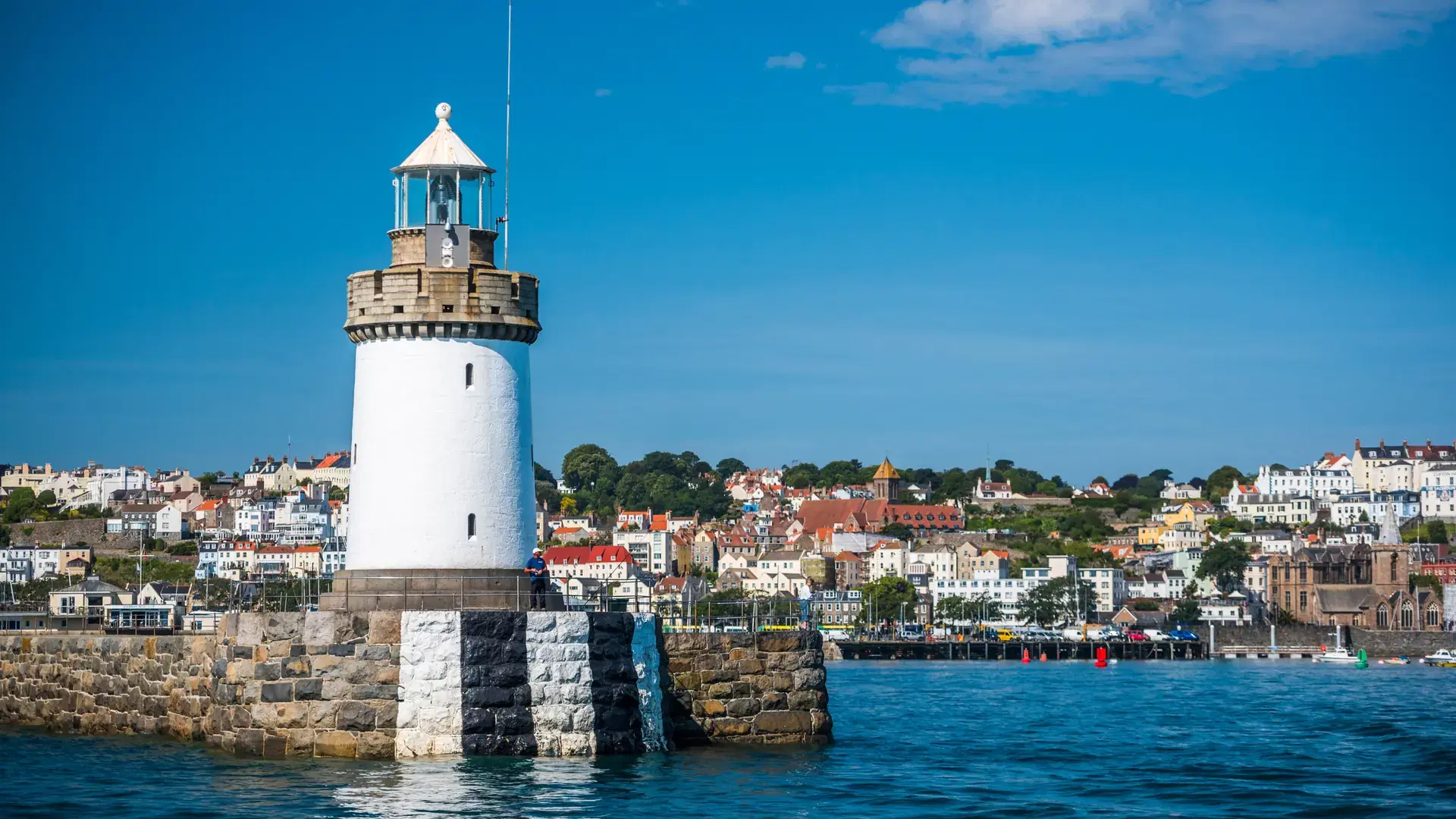 Lighthouse in St. Peter Port Harbour, Guernsey, Channel Islands, United Kingdom, Europe