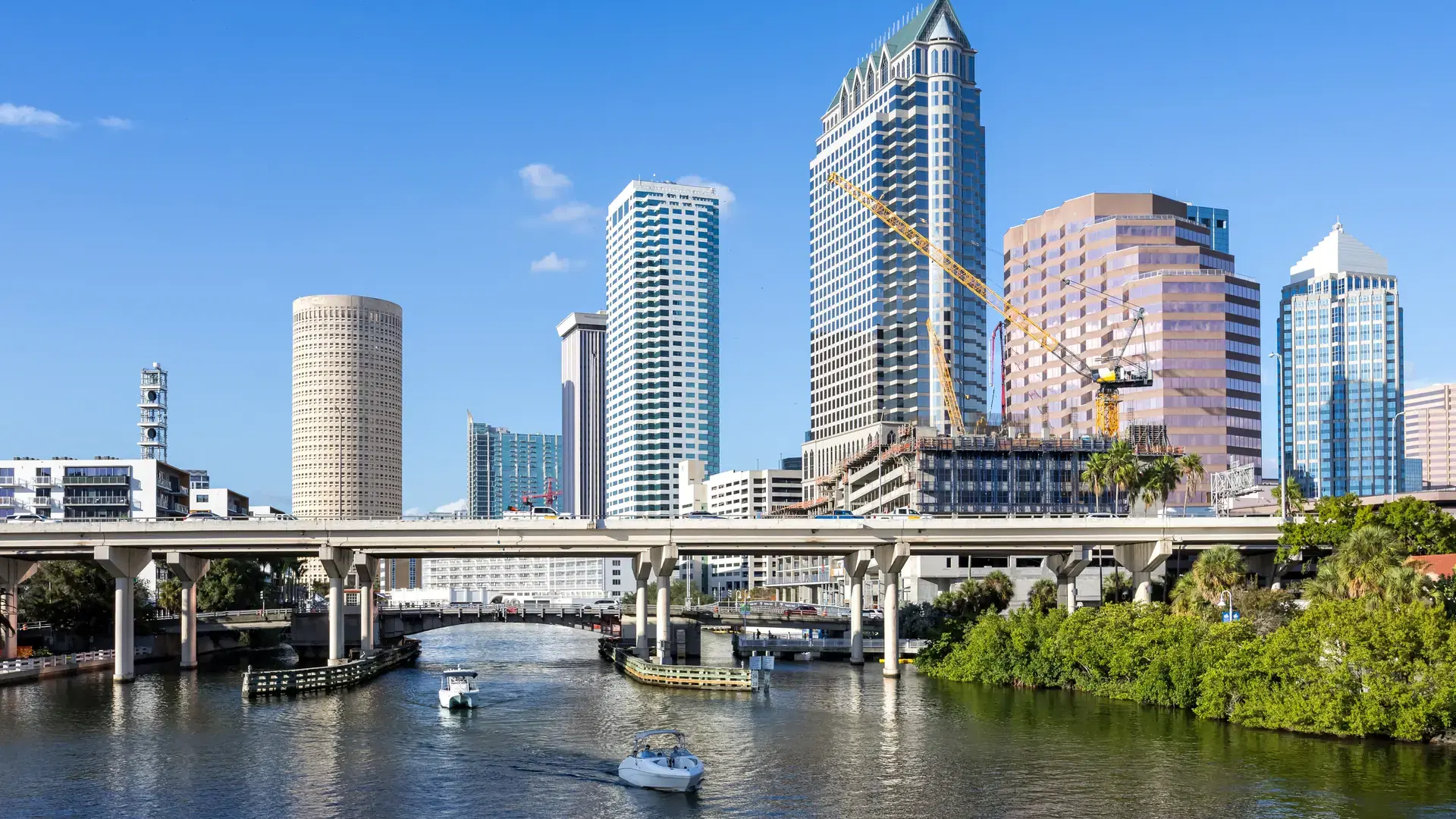 Tampa skyline with skyscrapers real estate office bridge over Hillsborough River in downtown Tampa, United States